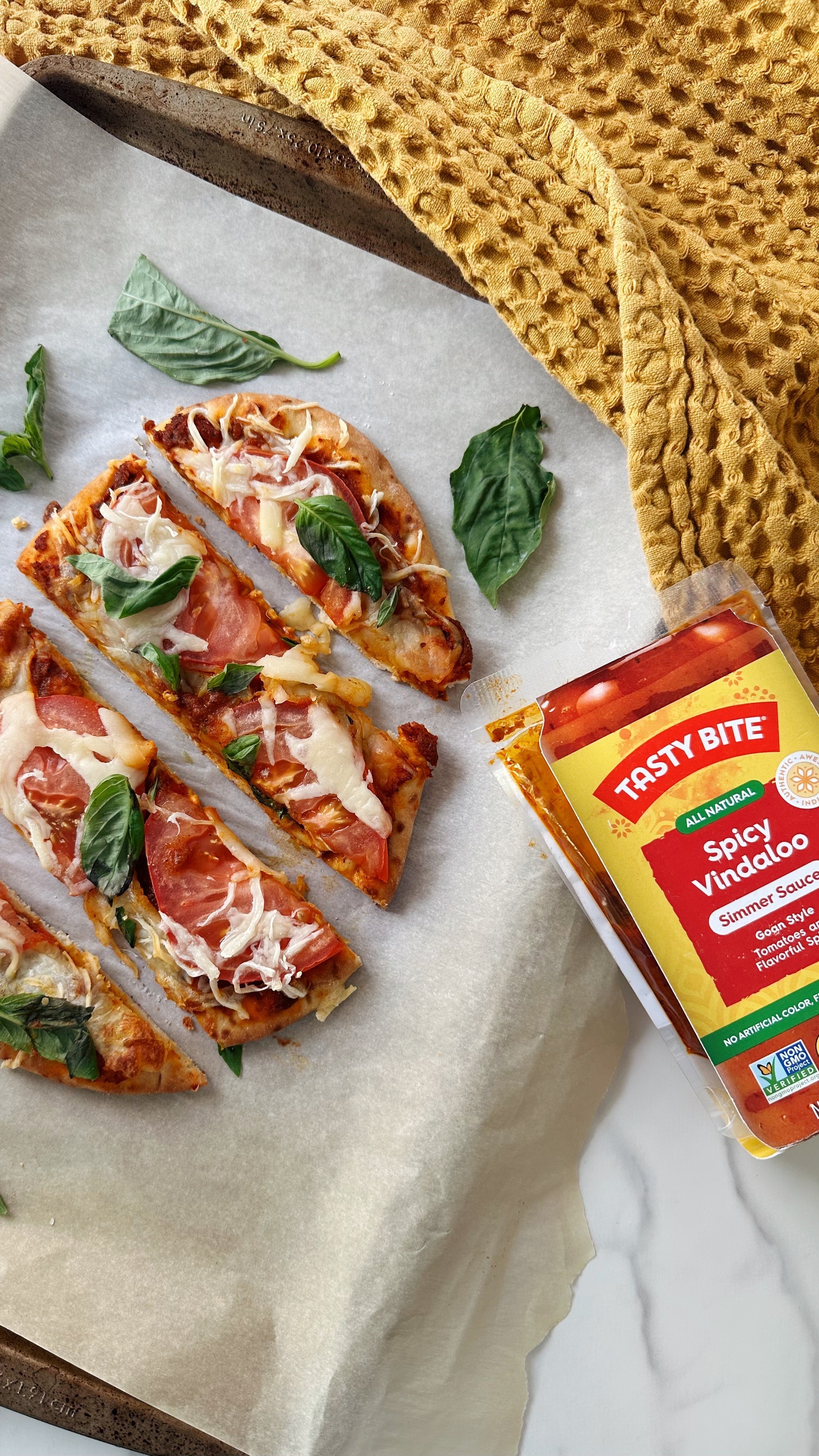 Naan pizza with Spicy Vindaloo sauce from Tasty Bite