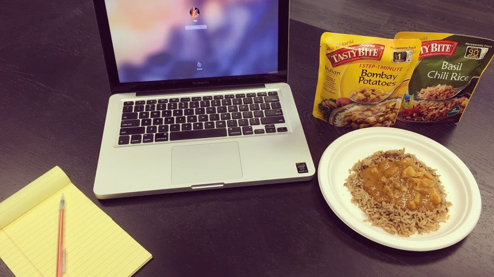 Healthy Tasty Bite Bombay Potao lunch in front of a computer