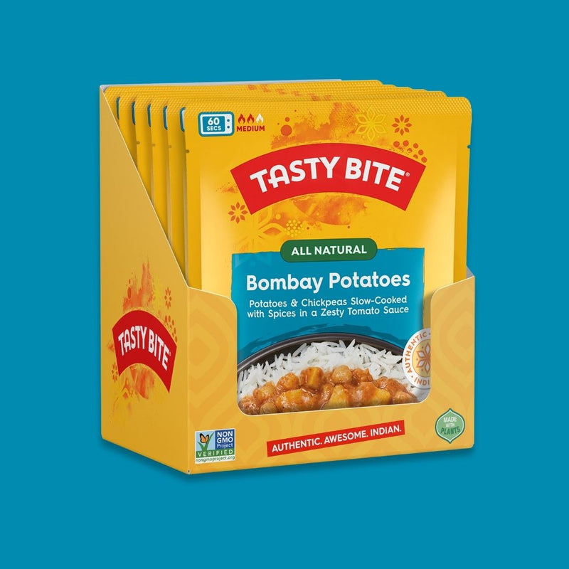 Tasty Bite Bombay Potatoes 6 pack packaging on a blue background