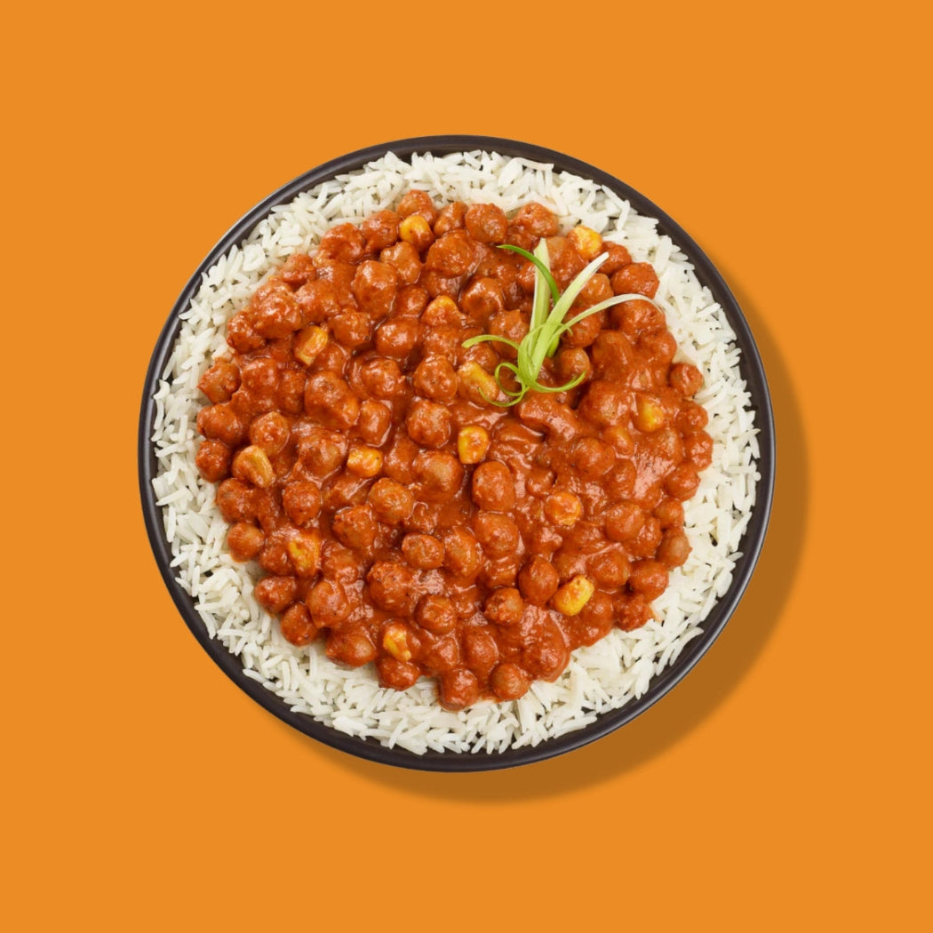 Tasty Bite Butter Chickpea & Vegetables with rice in a bowl