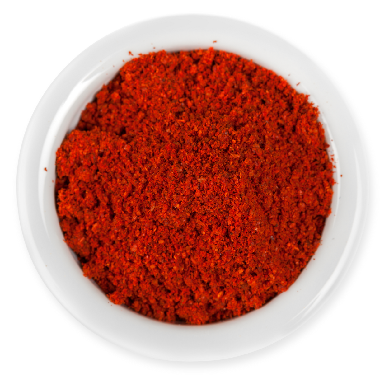 Red chili powder in a white bowl
