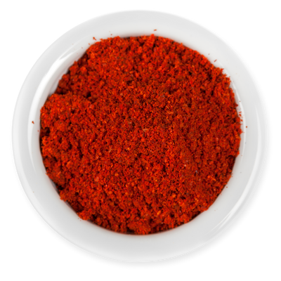 Red chili powder in a white bowl